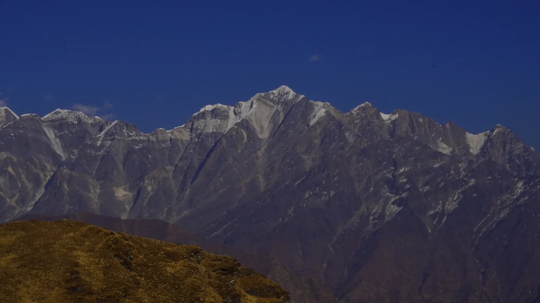 Rocky Garhwal Himalayan ridge viewed from the high meadow
