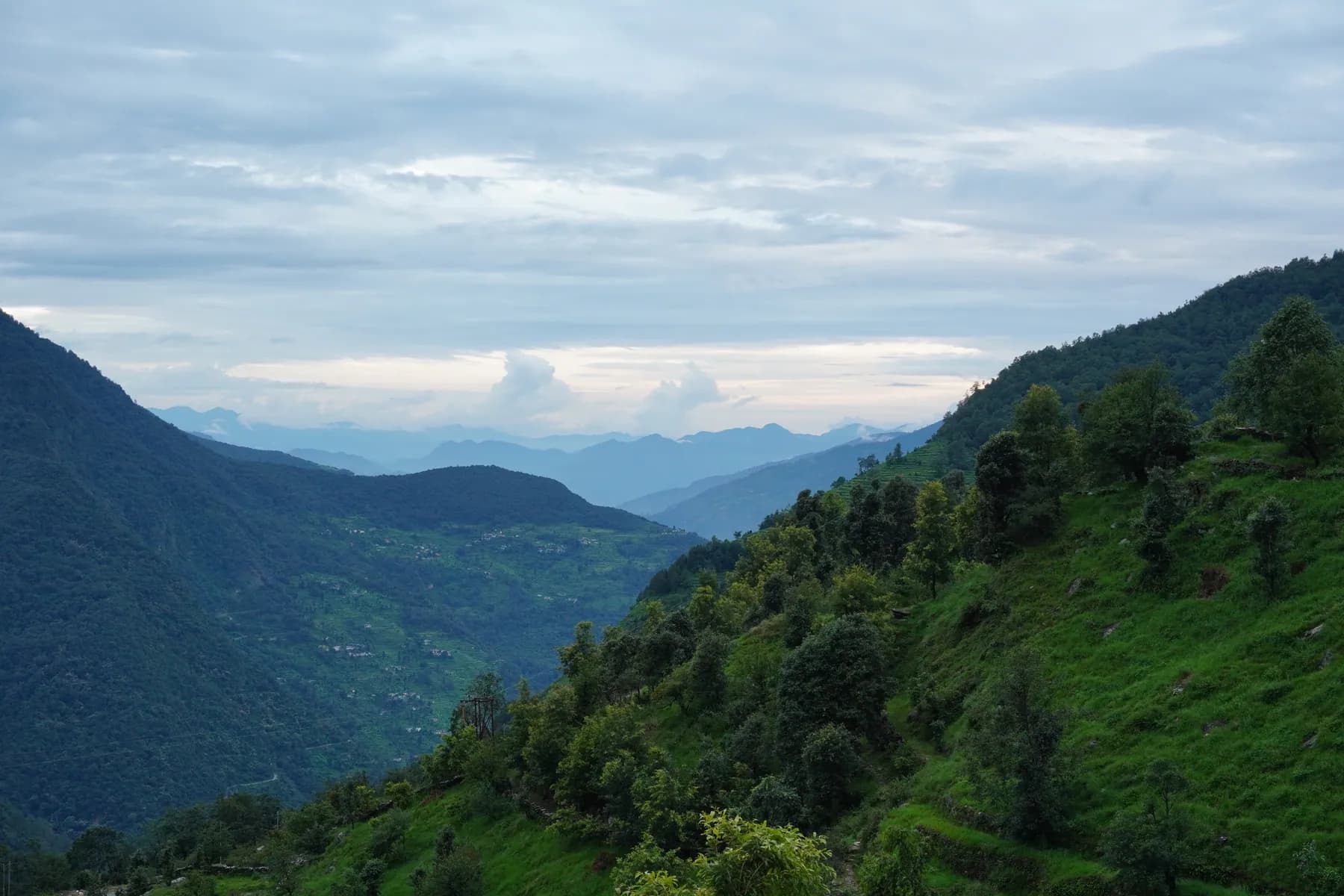 Green terraced mountain valley near the Sari Village expedition base