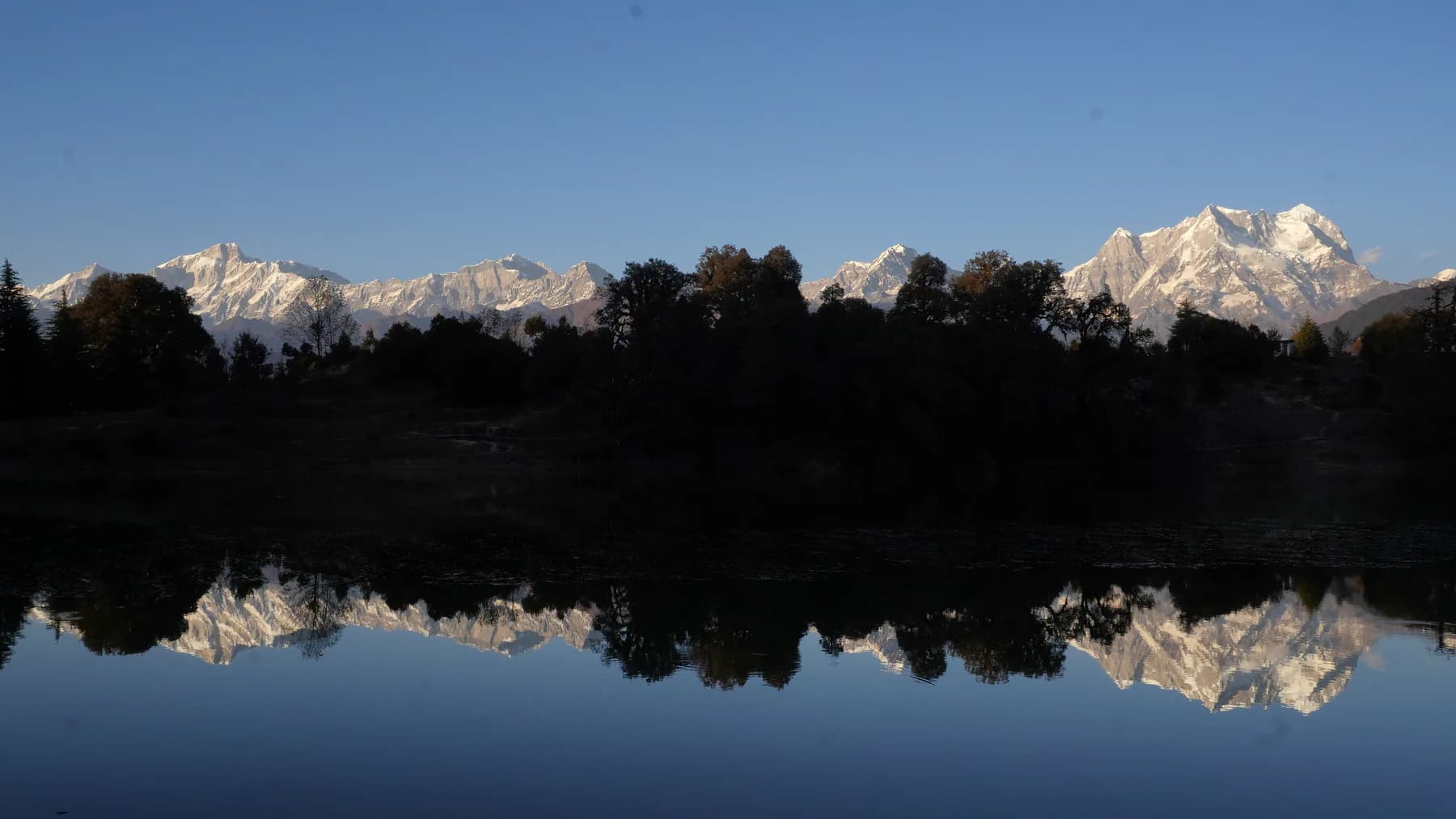 Garhwal Himalayan panorama reflected across Deoriatal lake